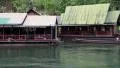 Houses on the bank of Kwai river in northwestern Thailand HD Footage
