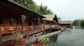 Houses on the bank of Kwai river in Thailand HD Footage