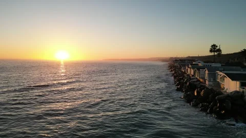 Houses on the beach sunset Stock Footage 249376715
