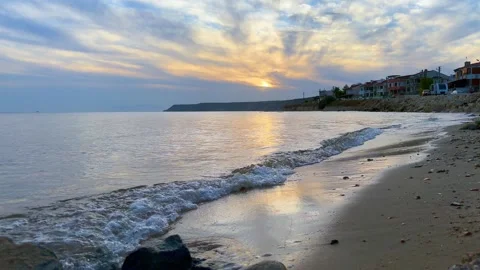 Houses on the beach at sunset Stock Footage 288903542