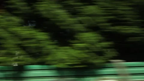 Houses, blurred trees, movement, view from a moving train, Cologne, Germany Stock Footage 201658322