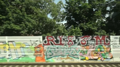 Houses, blurred trees, movement, view from a moving train, Cologne, Germany Video stock 201658361