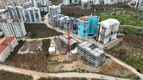 Houses construction process. Construction of a residential complex Stock Footage 223680721