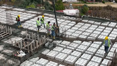 Houses construction process. Construction of a residential complex Stock Footage 223680728