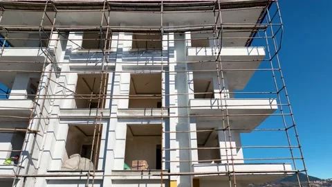 Houses construction process. Construction of a residential complex Stock Footage 223684077