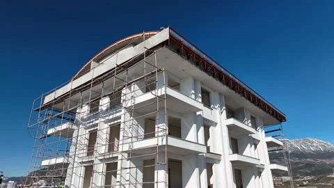 Houses construction process. Construction of a residential complex Stock Footage 223684606