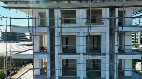 Houses construction process. Construction of a residential complex Stock Footage 223685152