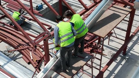 Houses construction process. Construction of a residential complex Stock Footage 223685493
