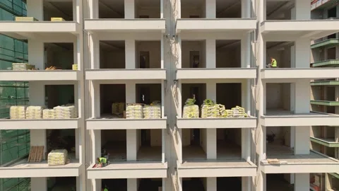 Houses construction process. Construction of a residential complex Stock Footage 223685953