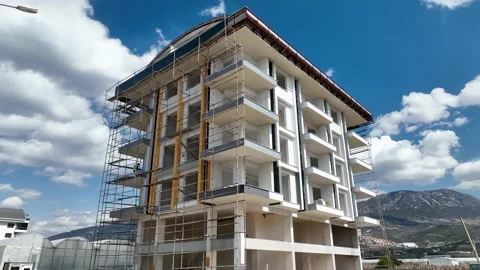 Houses construction process. Construction of a residential complex Stock Footage 223686885