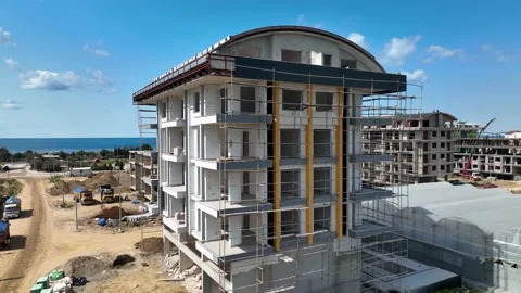 Houses construction process. Construction of a residential complex Stock Footage 223688080