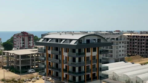 Houses construction process. Construction of a residential complex Stock Footage 223688995