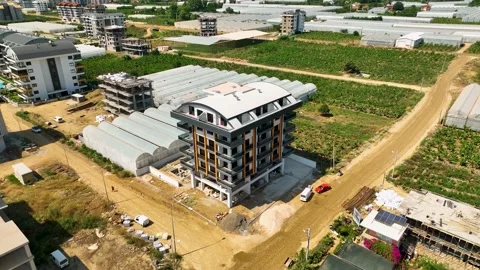 Houses construction process. Construction of a residential complex Stock Footage 223690166