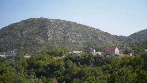 Houses on a mountainside Stock Footage 293254062