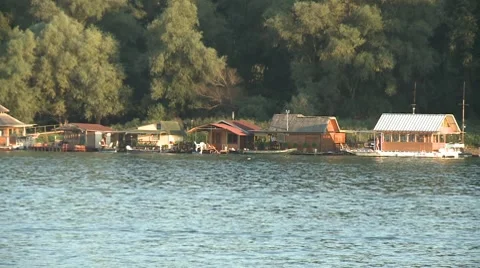 Houses on a river Stock Footage 8693237
