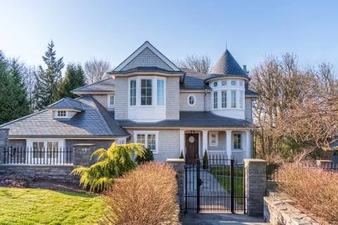 Houses in suburb at Summer in the north America. Luxury houses with nice land Stock Photos