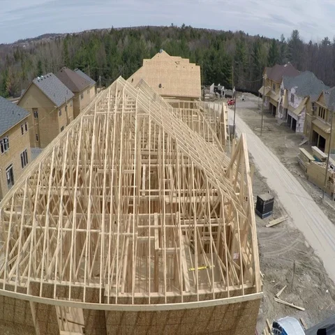 Houses under construct overtop Stock Footage 69734974