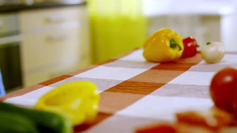 Housewife chops vegetables with sharp knife on board Stock Footage 231217948