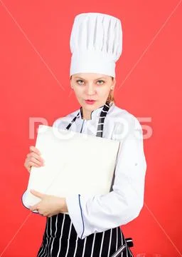 Housewife with cookery book. professional chef in kitchen. Cuisine. restaurant Stock Photos