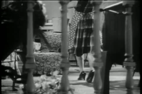 Housewife dancing in living room Stock Footage