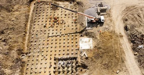 Housing development building site and road infrastructure aerial photo Stock Photos