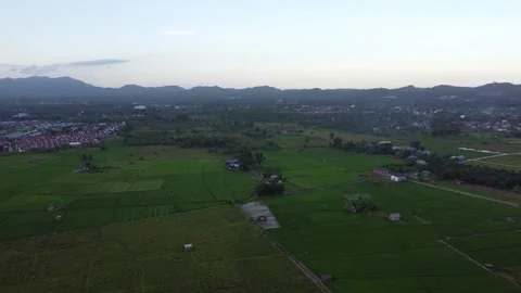 Housing or cities surrounded by mountains and plantations look very beautiful Stock Footage 274058084