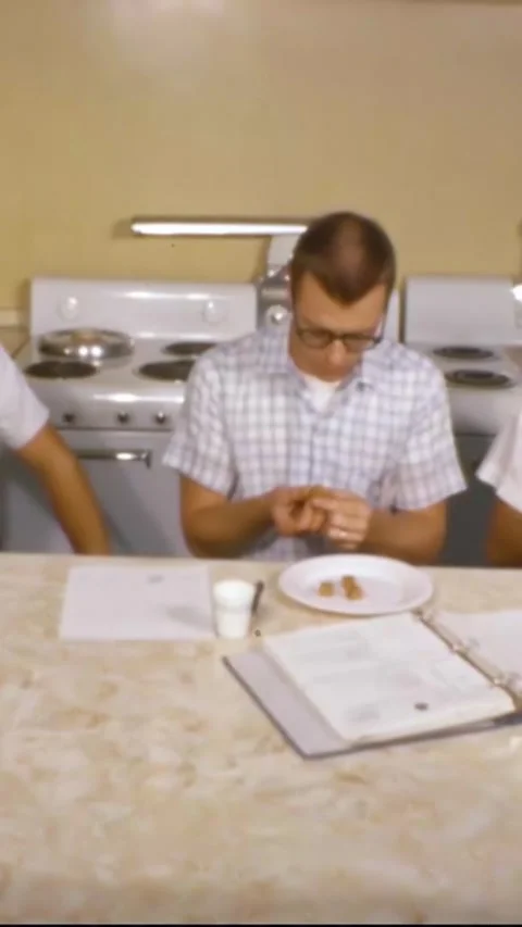 HOUSTON - 1966 - NASA technicians test eat space food. Stock Footage 342802688