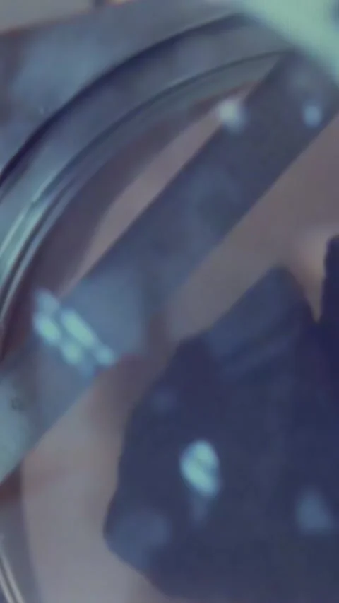 HOUSTON - 1969 - A split lunar rock is placed in a special containment chamber Video stock 342909371