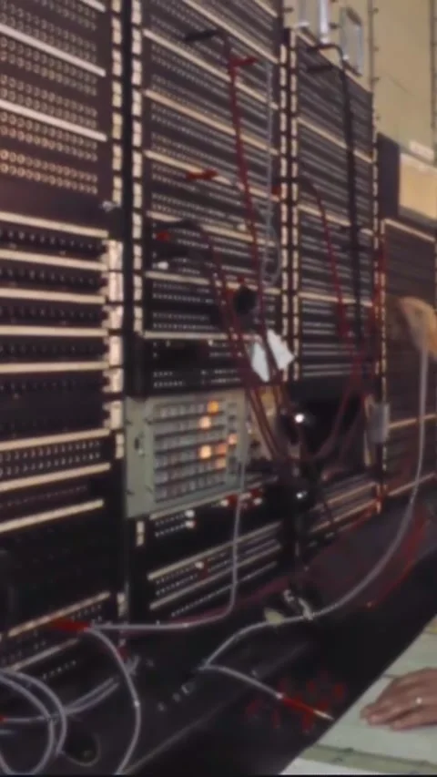 HOUSTON - 1970 - A man operates a switchboard at NASA's Mission Control Center. Stock Footage 342913634