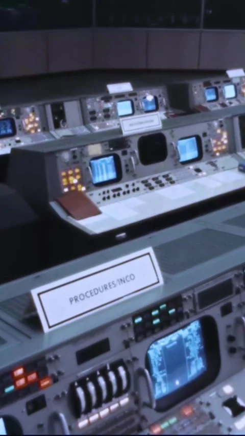 HOUSTON - 1970 - Pan past workstations in NASA's Mission Control Center from the Stock Footage 342916647