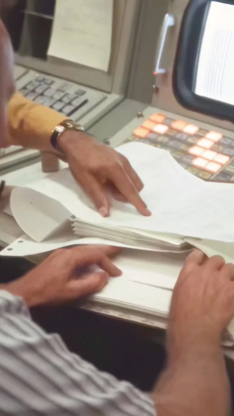 HOUSTON - 1971 - An aerospace engineer working in NASA's Mission Operations Stock Footage 340301878