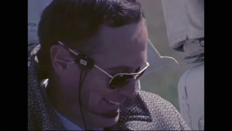HOUSTON - 1971 - Close-up view of astronaut Charles Duke learning to drive a Stock Footage 313052992
