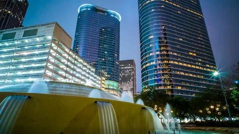 Houston Skyline time lapse at night 4K 1080p with buildings and water fountain Stock Footage 71473395