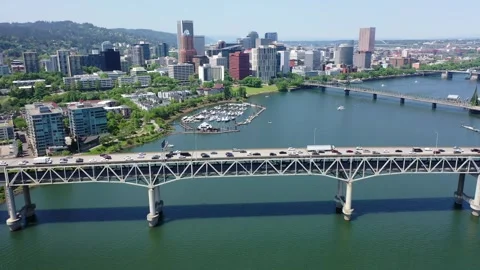 Hover above Willamette River in front of Marquam Bridge Stock Footage 244006113