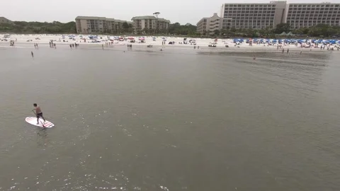 Hover Flight in Atlantic Ocean with Paddle Boarders-  Hilton Head, South Caro Video stock 134278761
