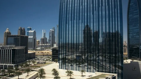 Hover over Emaar Boulevard at 50m. right pan of Emaar Square, Emaar Boulevard, Stock Footage 98928311