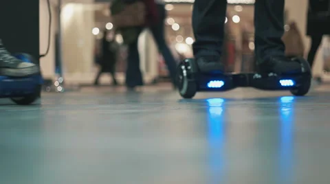 Hoverboard with Blue LED Lights Rolling Around. Video stock 58305060