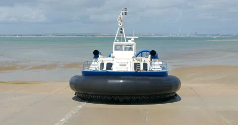 Hovercraft boat arriving on the beach Stock Footage 65441419