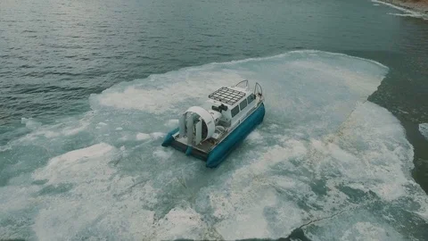 Hovercraft on the ice lake aerial view Stock Footage 78157119
