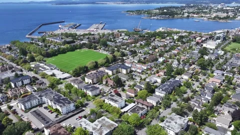 Hovering above James Bay district Victoria, left panning from Fisherman's Wharf Stock Footage 276334166