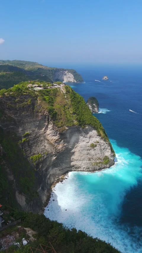 Hovering Above Kelingking Beach Cliff and Turquoise Cove in Nusa Penida Stock Footage 343958826