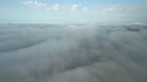 Hovering above waves of clouds in the sky. Stratus cloud. Stock Footage 234637872