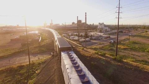 Hovering back over train Color Corrected Stock Footage 98845034