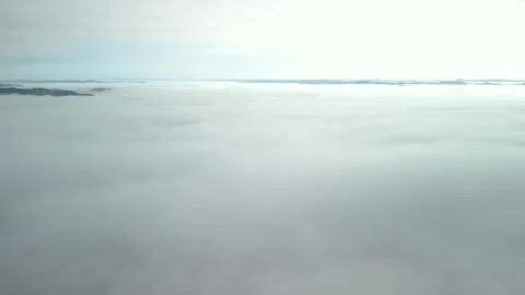 Hovering between two layers of clouds. Flying above the clouds. Stock Footage 234638005