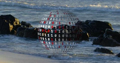 Hovering binary sphere showing white and red digits above beach rocks, wet sand Stock Photos