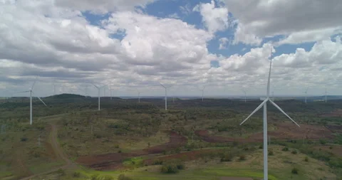Hovering drone view of  Wind Turbines On Hills at wind farm,QLD Australia Stock Footage 297588345