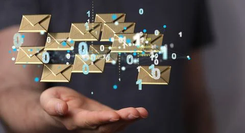 Hovering envelopes with binary numbers above the hand. Stock Photos