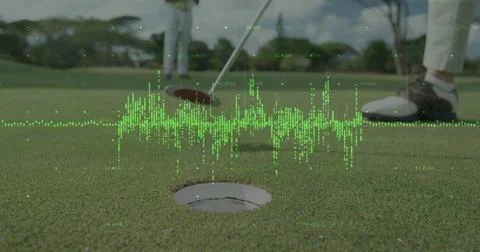 Hovering golf putter head above cup on putting green at golf course, with data Stock Photos