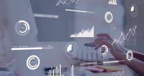 Hovering hands initiating typing on keyboard, updating graphs and charts showing 動画素材 310317645