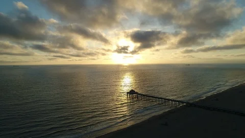 Hovering high above Manhattan Beach, Los Angeles, California - * Unedited * Video stock 90105587